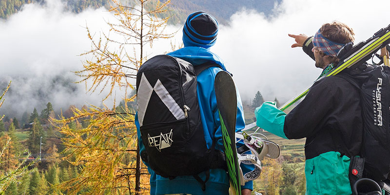 Touring bag with integrated kite harness